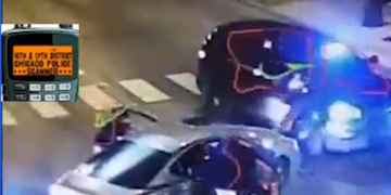 Video: Chicago Police Officer Pinned Between Cars, Shot At By Suspect