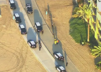 One Person Is Dead, Three Others Injured After Suspect Runs Along Beach Stabbing Victims